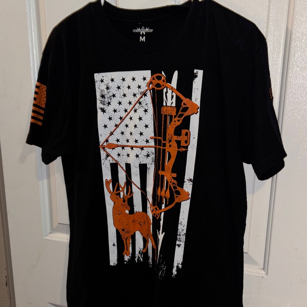 Black Graphic T-Shirt with Orange Design